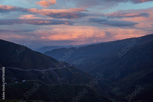 Beautiful mountain landscape at sunset, mountainous Dagestan. Serpentine road