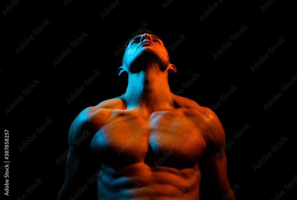 Muscular man body and strong shoulder muscles. Sexy gay isolated on black.  foto de Stock | Adobe Stock