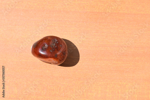 Polished Carnelian Gemstone Used to Balace 2nd Chakra in Crystal Healing photo