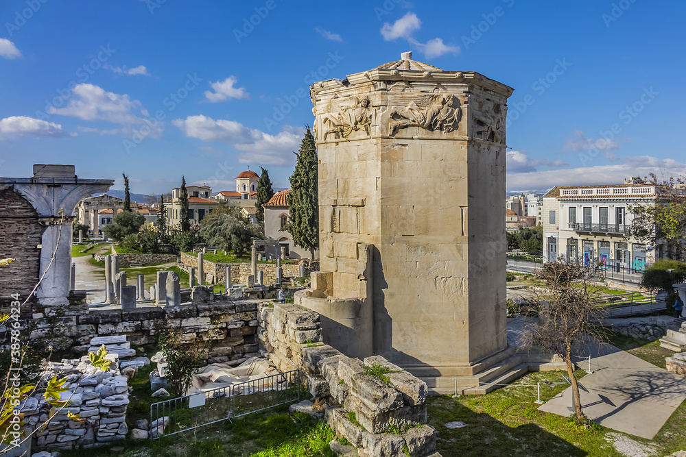 Tower of the Winds (2nd century BC) - octagonal Pentelic marble clock tower in Roman Agora built in Athens during the Roman period. Athens, Greece.
