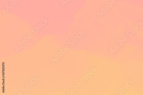 Pale delicate blurred pink and peach color abstract background
