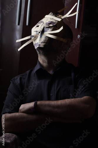  PERSON USING AN ARTISTIC MASK