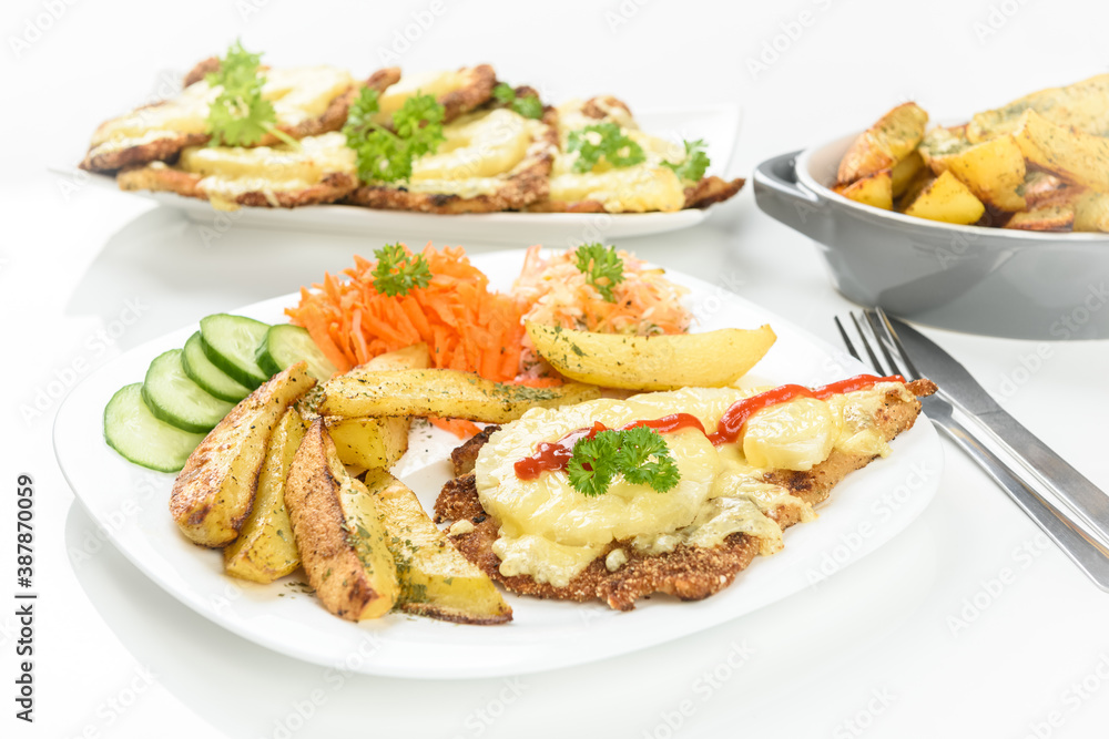 cutlet with pineapple and baked potatoes with bouquet of salads cutlet with pineapple and baked potatoes with bouquet of salads