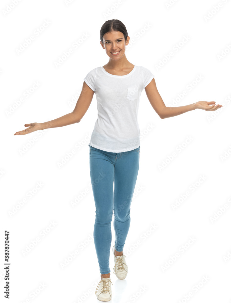 Positive casual woman welcoming and inviting, walking Positive casual woman welcoming and inviting, walking