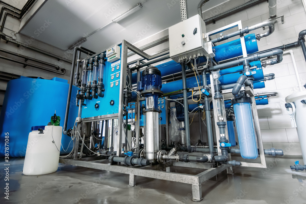 Modern automatic treatment and filtration of drinking water system. Plant  or factory for production of purified drinking water. Photos | Adobe Stock