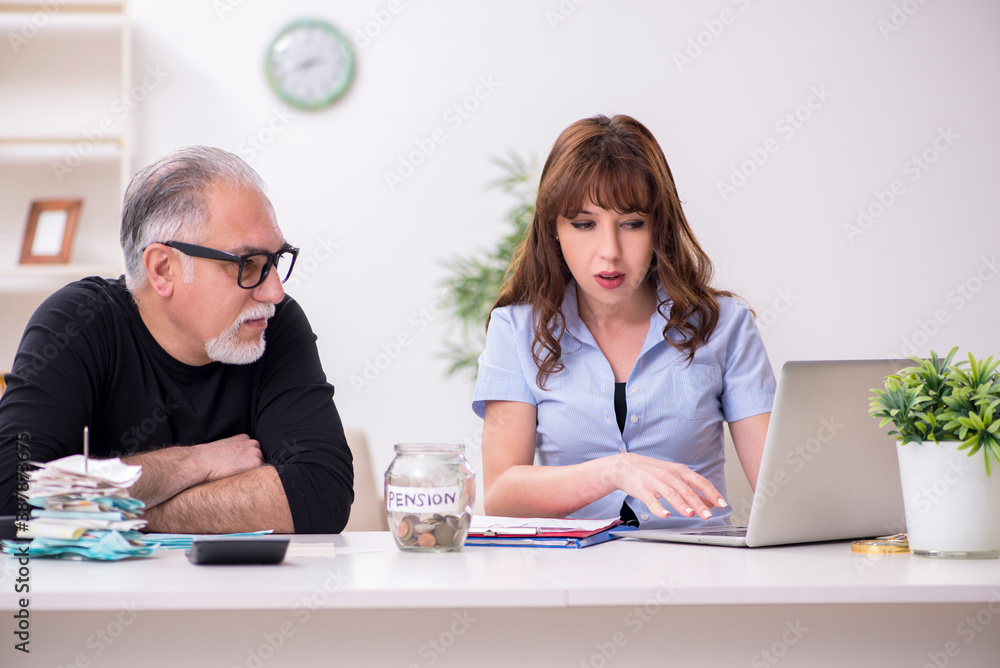 Financial advisor giving retirement advice to old man