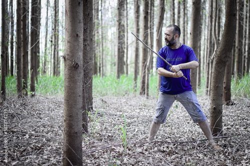  man training with wooden sword