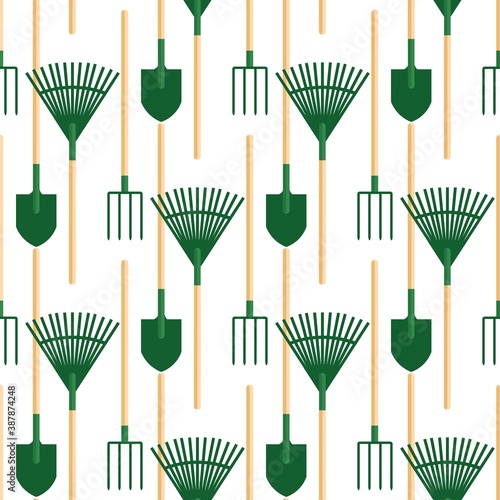 Seamless pattern with shovel, pitchfork and broom on a white background. Gardening tool in a flat style. Cartoon objects of labor. Stock vector illustration for design, decor, fabric.