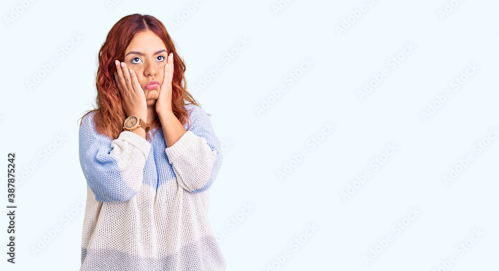 Young latin woman wearing casual clothes tired hands covering face, depression and sadness, upset and irritated for problem