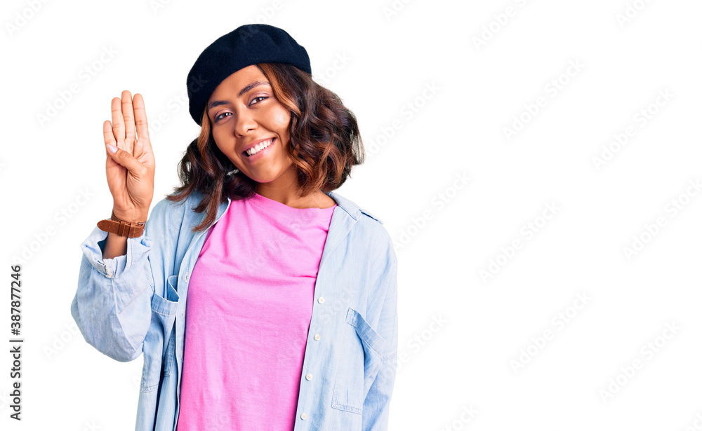 Young beautiful mixed race woman wearing french look with beret showing and pointing up with fingers number four while smiling confident and happy. Young beautiful mixed race woman wearing french look with beret showing and pointing up with fingers number four while smiling confident and happy.