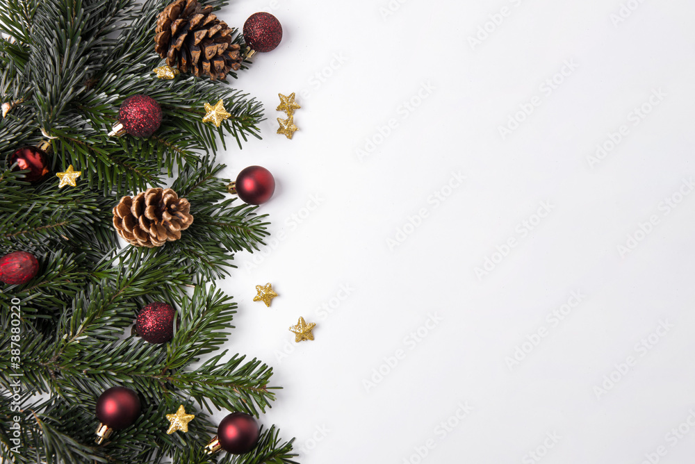 Festive Christmas background with baubles and pine branches Festive Christmas background with baubles and pine branches