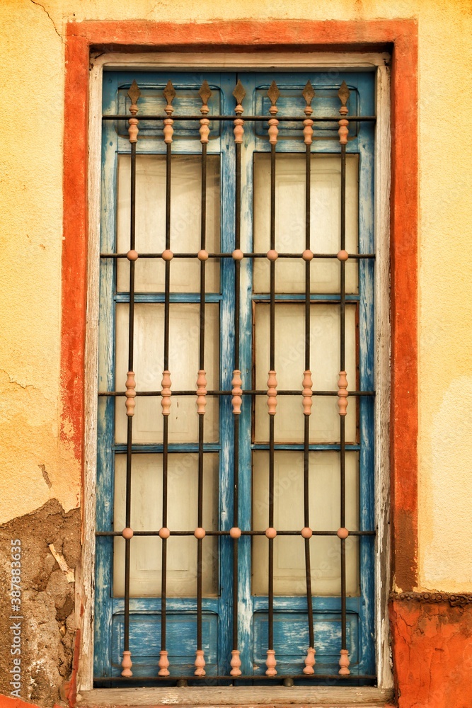 Typical vintage portuguese facade with old window