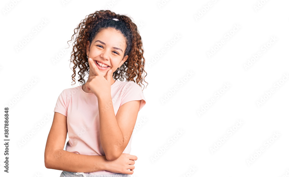 Beautiful kid girl with curly hair wearing casual clothes looking confident at the camera smiling with crossed arms and hand raised on chin. thinking positive. Beautiful kid girl with curly hair wearing casual clothes looking confident at the camera smiling with crossed arms and hand raised on chin. thinking positive.