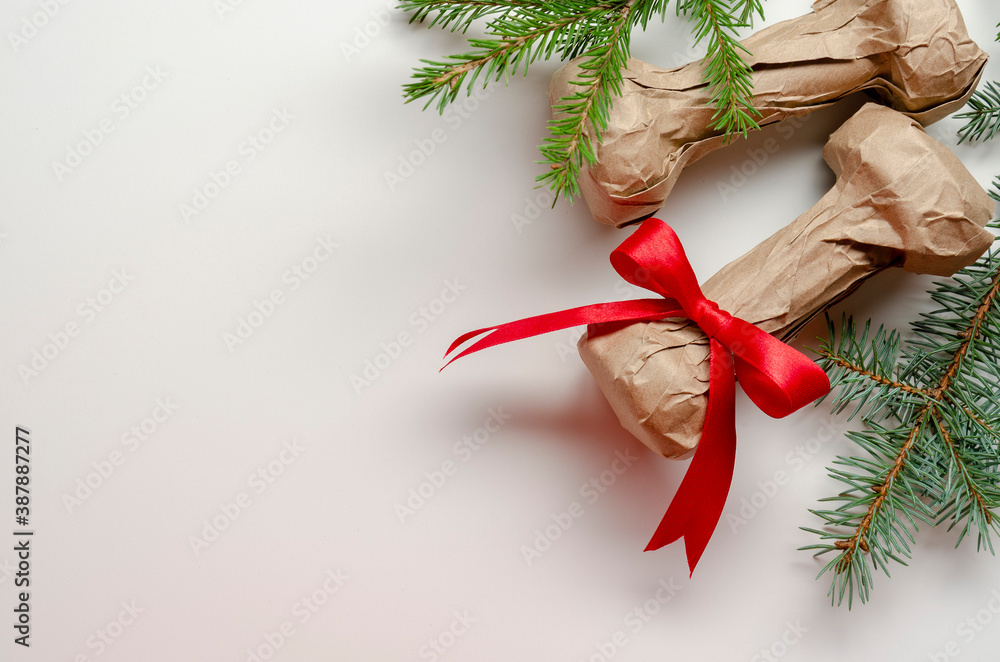 Holiday christmas dumbbells as craft gifts on white background - obrazy, fototapety, plakaty 