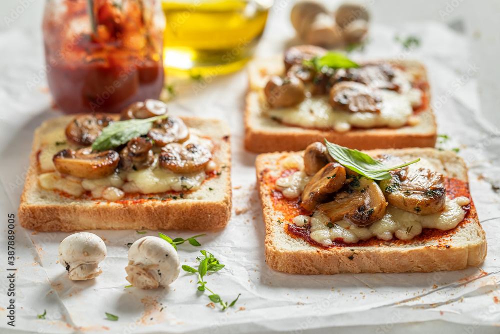 Rustic Toast with mushrooms, basil and cheese