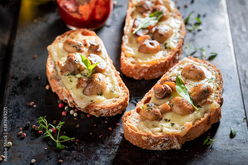 Homemade Toast with mushrooms, cheese and olive oil Homemade Toast with mushrooms, cheese and olive oil
