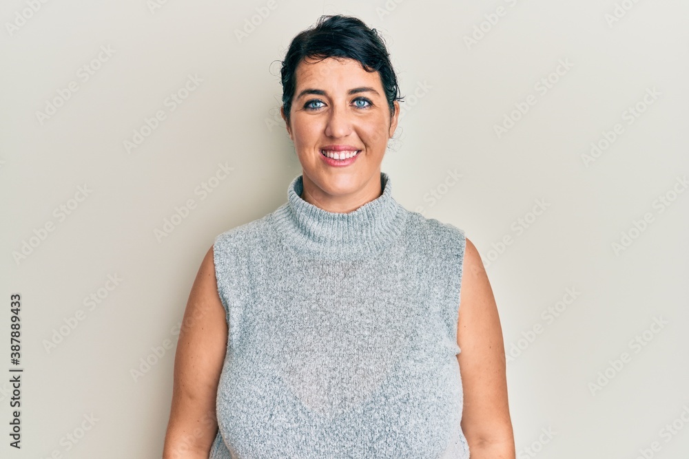 Plus size brunette woman wearing casual clothes with a happy and cool smile on face. lucky person. Plus size brunette woman wearing casual clothes with a happy and cool smile on face. lucky person.