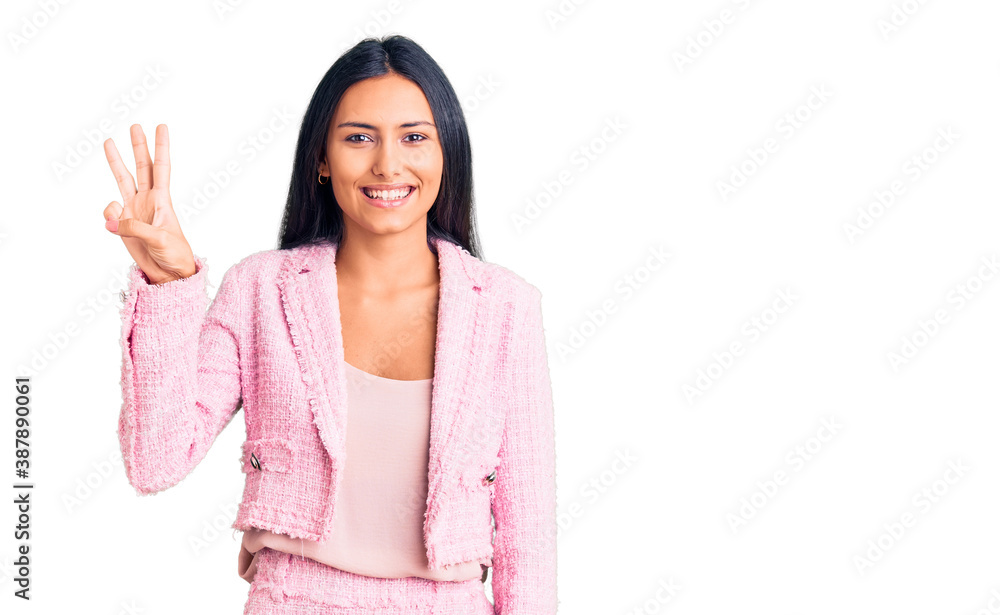 Young beautiful latin girl wearing business clothes showing and pointing up with fingers number three while smiling confident and happy. Young beautiful latin girl wearing business clothes showing and pointing up with fingers number three while smiling confident and happy.
