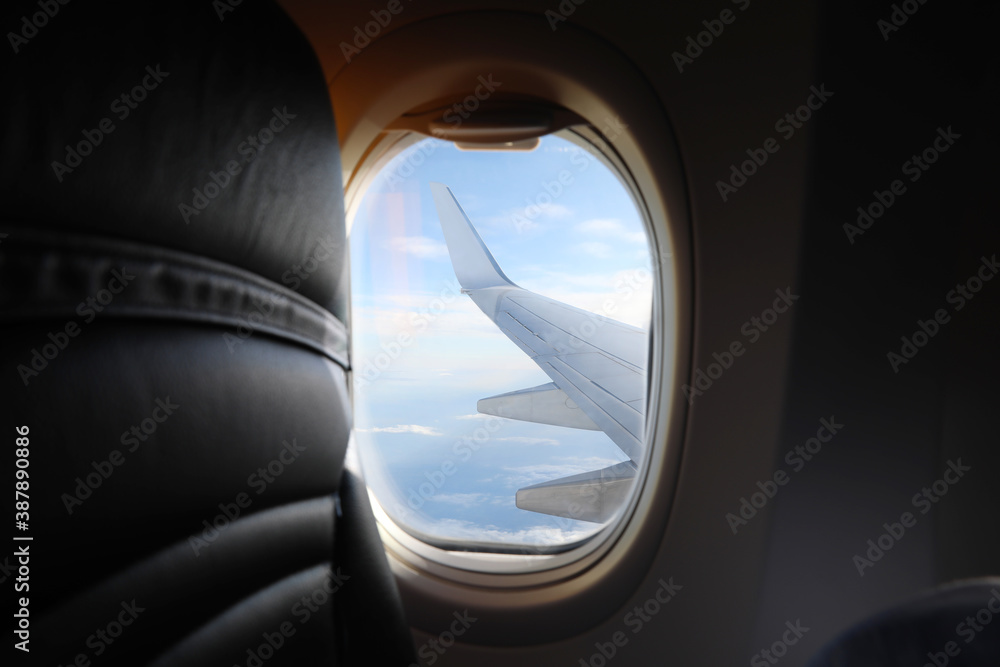 Naklejka premium Beautiful view through plane window during flight. Air travel