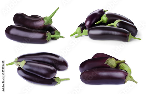 Set of fresh eggplants on white background