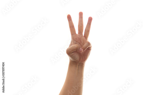 Gesture of hand showing number three with fingers