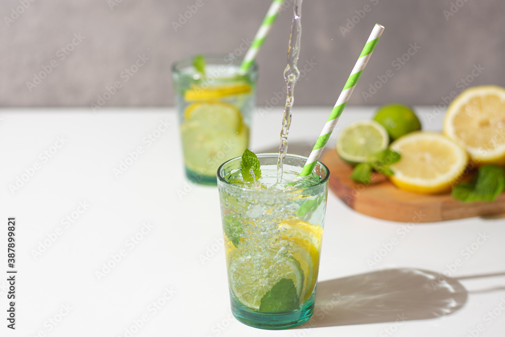 Fototapeta premium Lemonade being served, splash water effect