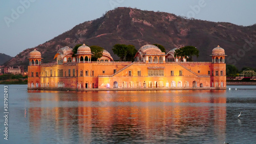 evening close up of jal mahal palace illuminated by lights in jaipur photo