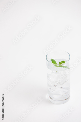 ice cube and water in glass