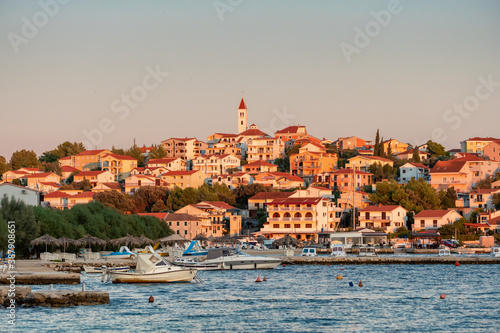Fototapeta Naklejka Na Ścianę i Meble -  Small Mediterranean town Seget Donji near the Trogir town at sunset, Croatia