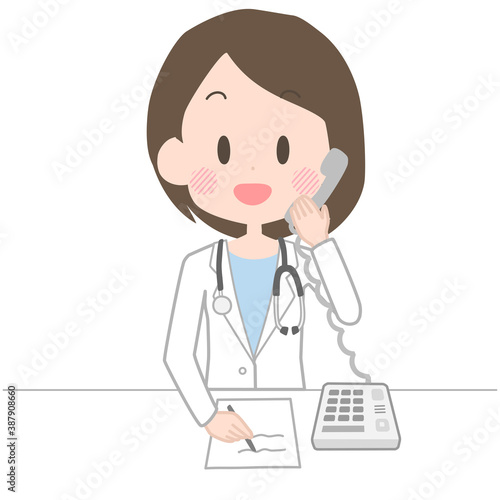 電話診療をする女性医師