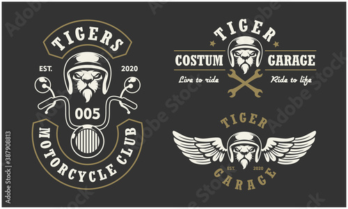 Tiger head auto repair and custom garage logo. Design element for company logo, label, emblem, sign, apparel or other merchandise. Scalable and editable Vector illustration.