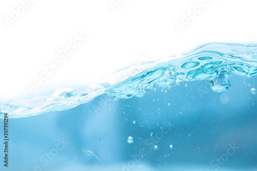Clear flowing water waves and bubbles isolated on white background
