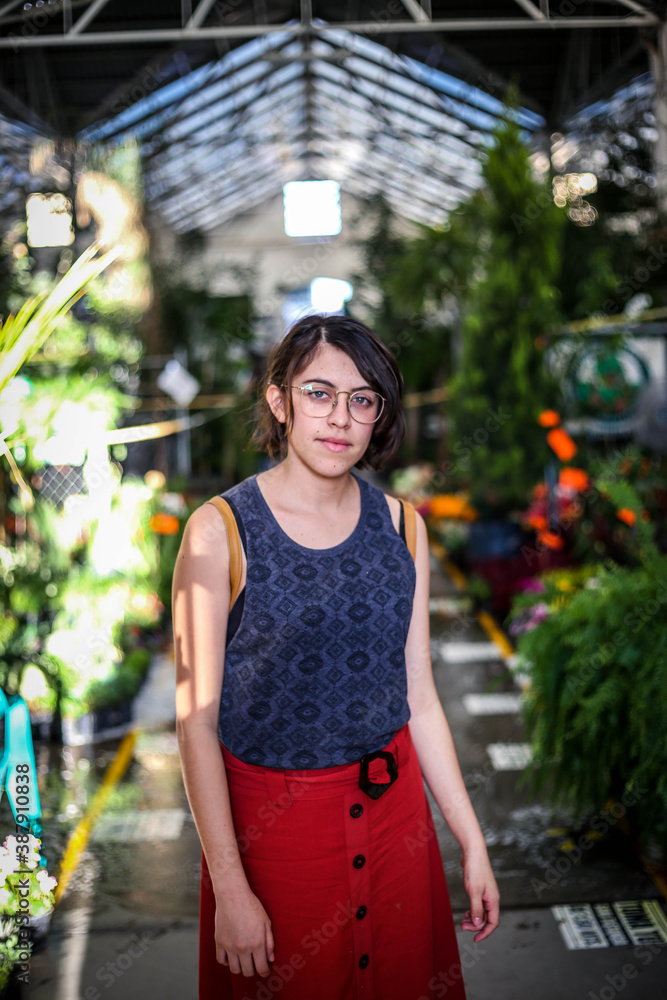 Happy travel woman on vacation concept. Funny traveler enjoy her trip and ready to adventure. Mexico, mercado de las flores Happy travel woman on vacation concept. Funny traveler enjoy her trip and ready to adventure. Mexico, mercado de las flores