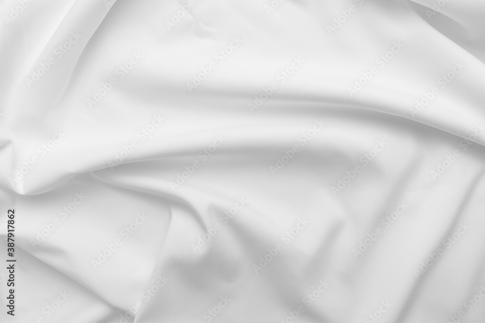 Abstract white fabric texture background. Cloth soft wave. Creases of satin. silk and cotton. Abstract white fabric texture background. Cloth soft wave. Creases of satin. silk and cotton.