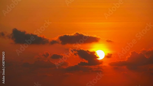 sunset back on red sky and dark cloud moving time lapse