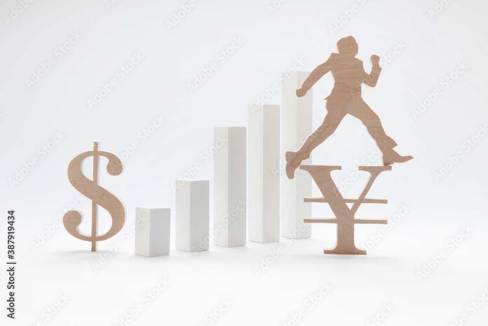 円マークとドルマークとビジネスマン Stock Photo Adobe Stock