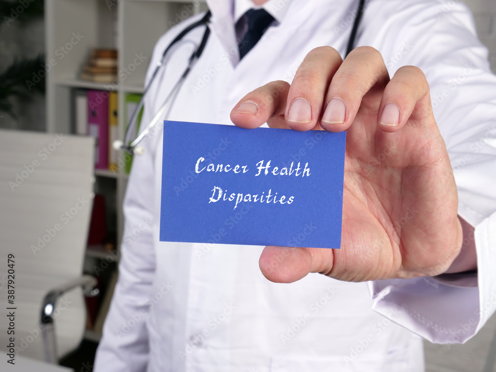 Medical concept about Cancer Health Disparities with sign on the sheet. Medical concept about Cancer Health Disparities with sign on the sheet.
