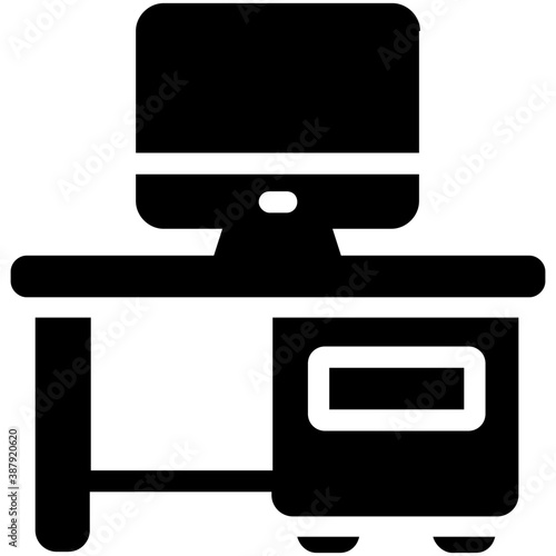 
An icon embedded with study lamp and monitor on office desk showing workplace concept
