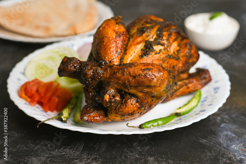 Принти на полотні A plate of full thandoori chicken , Arabian spicy food tandoori whole chicken Bengaluru, India