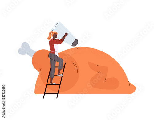 Tiny woman cooks roasted turkey for Thanksgiving meal, flat vector illustration isolated on white background. Autumn Thanksgiving festive dish cooking.