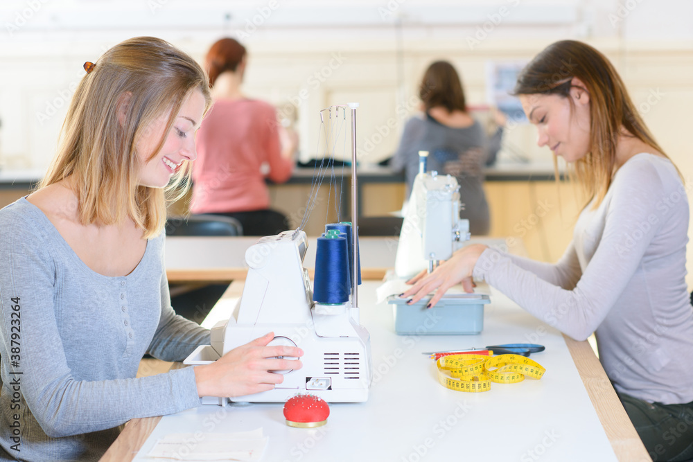 Fototapeta premium women in a sewing workshop