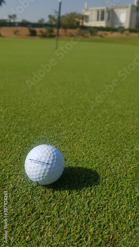 A golf ball on the green