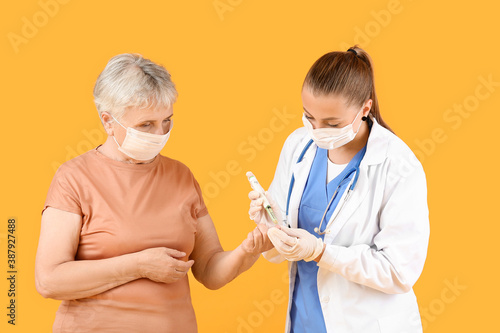 Doctor taking blood sample ...