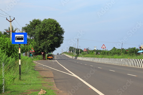 Photography Beautiful national highway road landscape images with bus stop road signal
