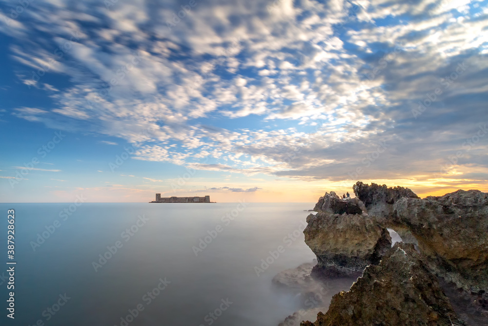Long exposure landscape of the Maiden's Castle (Turkish: Kizkalesi). The castle was established to prevent attacks from the Sea. It contains remains of a church.