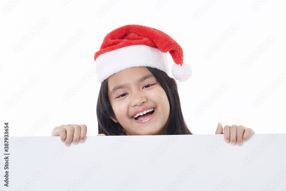 Happy little girl holding a blank board Happy little girl holding a blank board