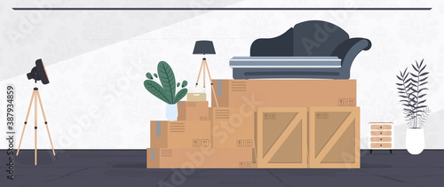 Moving home banner. Moving to a new place. Wooden boxes, cardboard boxes, sofa, houseplant, floor lamp. Vector.
