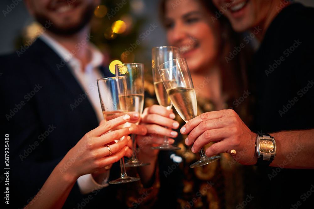 Two beautiful young couples having fun at New Year's Eve Party Two beautiful young couples having fun at New Year's Eve Party