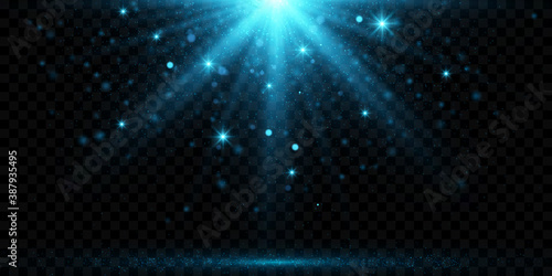 Vector blue sparkling light effect isolated on dark transparent background. 