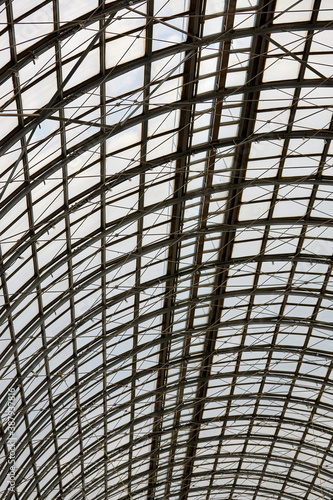 Glass-metal roof of the building of trade center